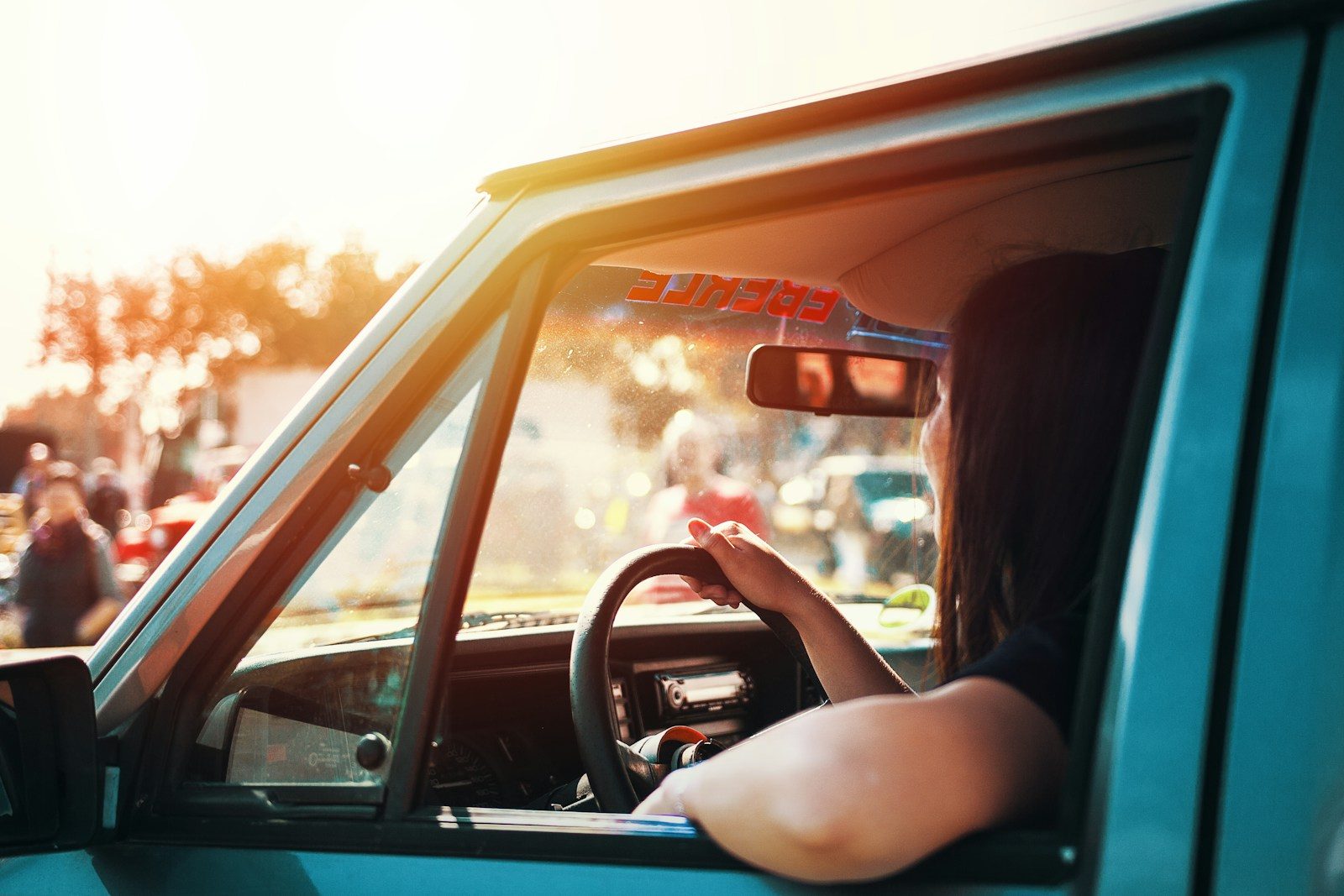 Woman driving after resolving her Thousand Oaks lemon law claim